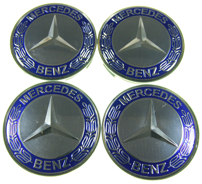 Caches moyeux MERCEDES 75mm logo étoile chrome fond bleu ciel.